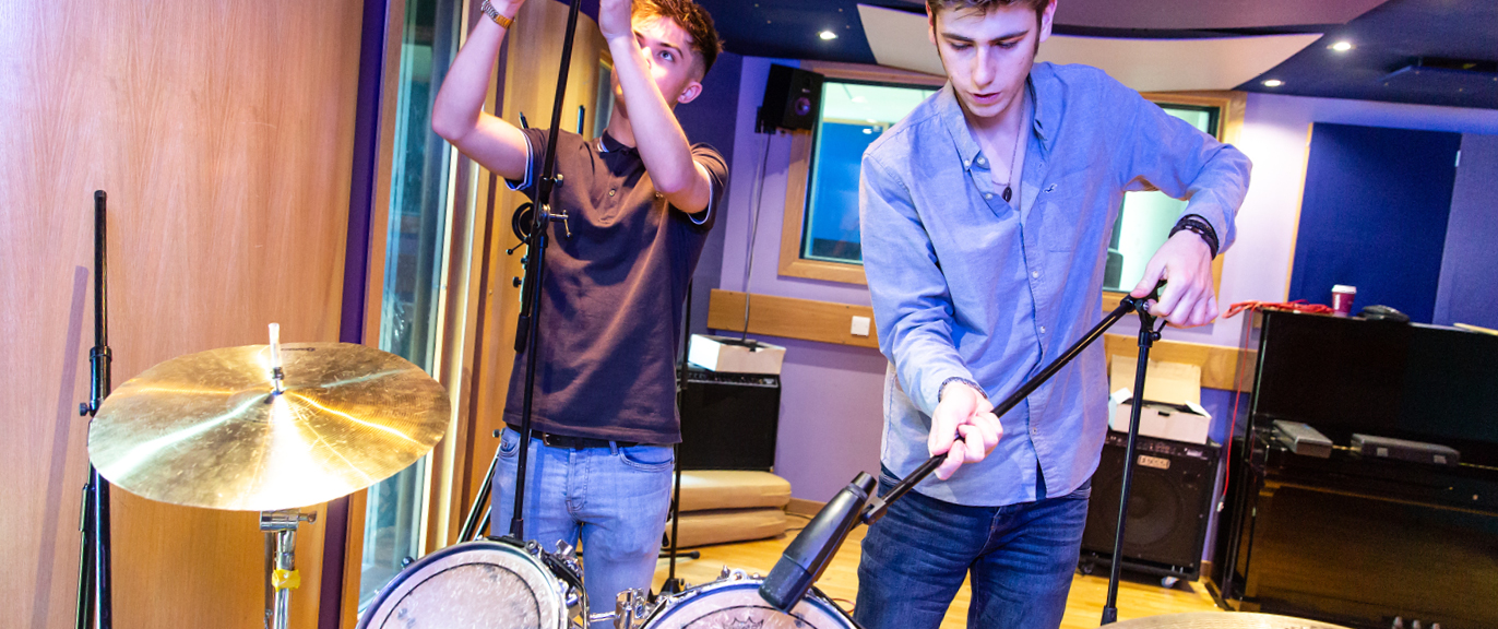Two students in recording studio
