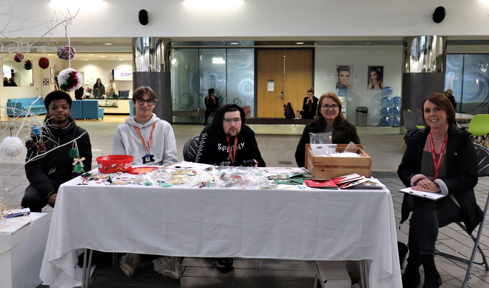 Students and staff manning festive stall