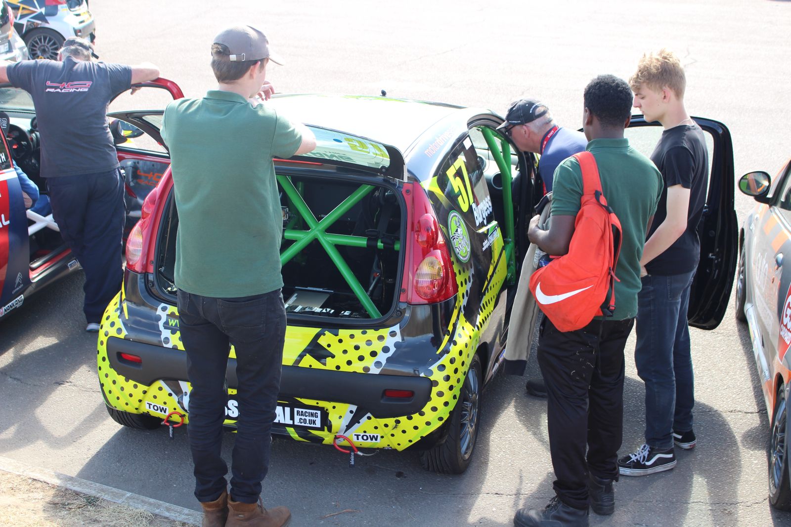 Students checking the car before the final race of the day