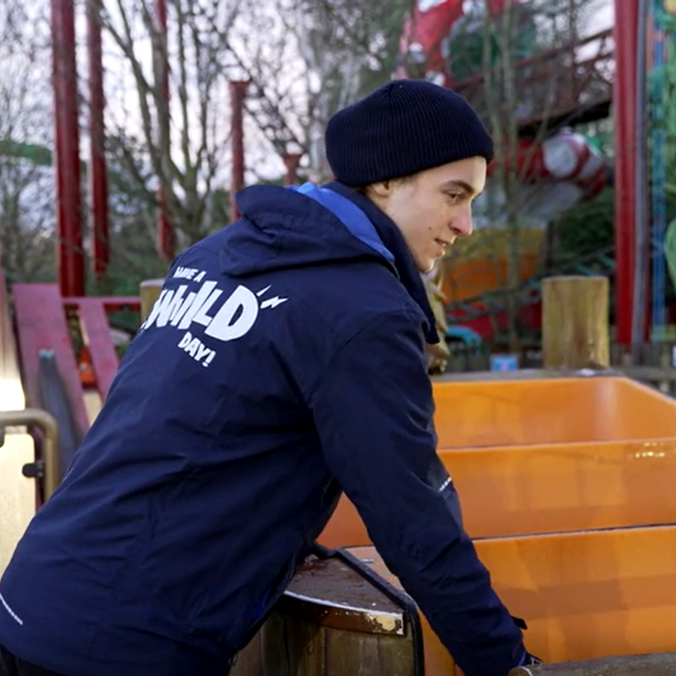 Thomas, working on a ride at a theme park.